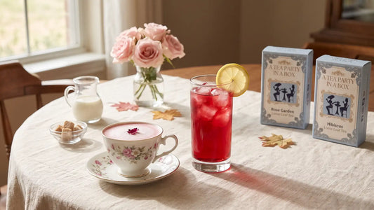 Rose tea latte and a glass of hibiscus lemonade on a pink and cream October tea table