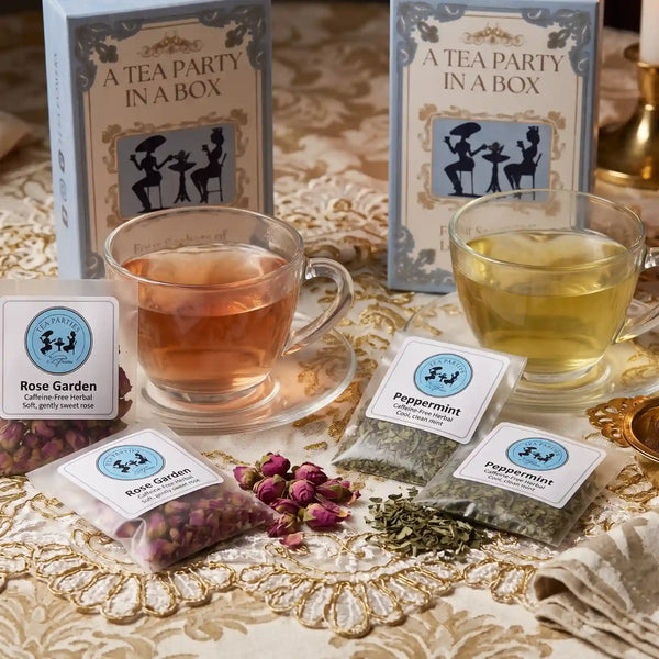 Calming teas for evening: Rose Garden and Peppermint brewed in glass cups on a kitchen table at night