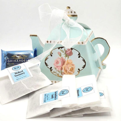 Tea set with floral design on a white background